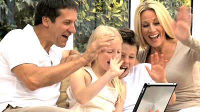 stock-footage-caucasian-family-using-wireless-tablet-for-online-video-chat